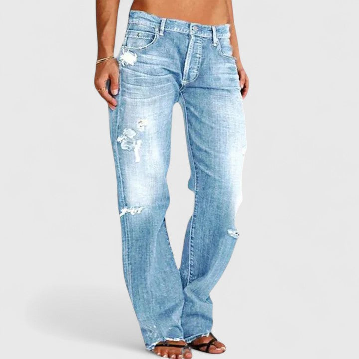Jeansy damskie bootcut z przetarciami bawełniane jesienne
