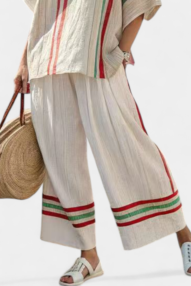 Komplet damski na lato z bluzką w stylu boho i luźnymi spodniami w paski z lnu