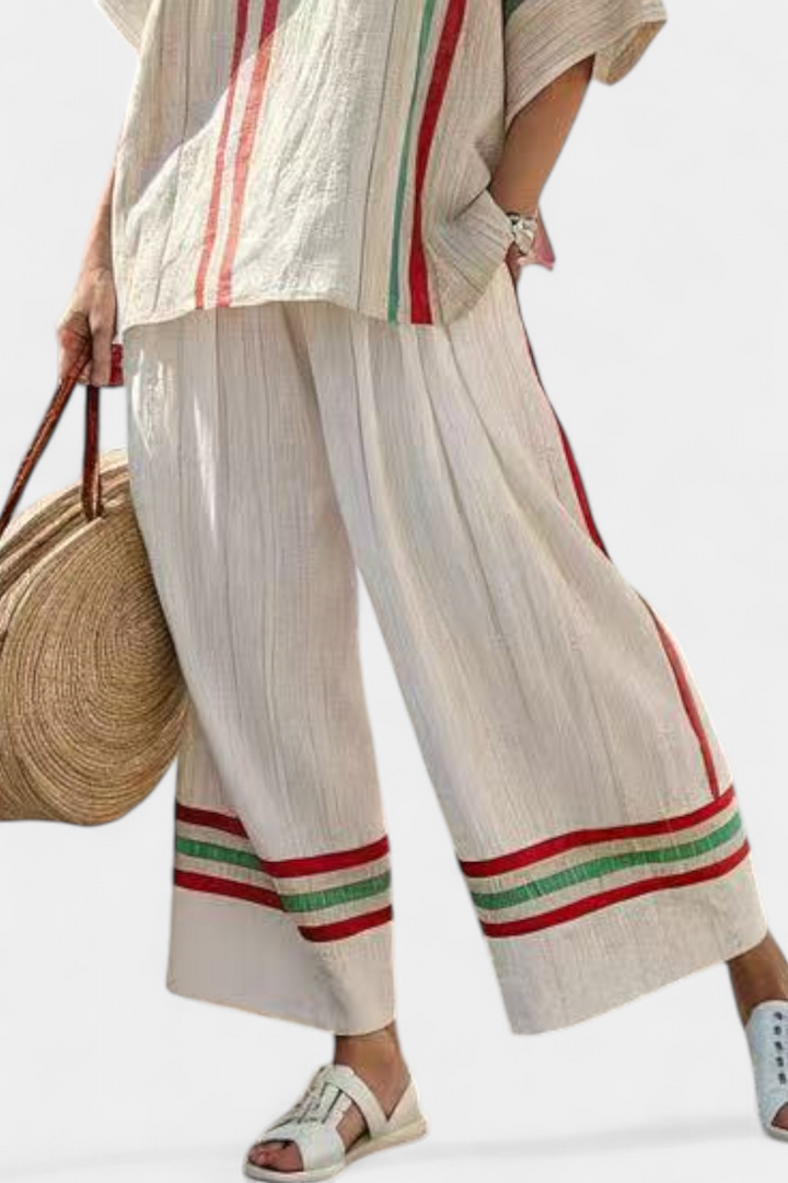 Komplet damski na lato z bluzką w stylu boho i luźnymi spodniami w paski z lnu