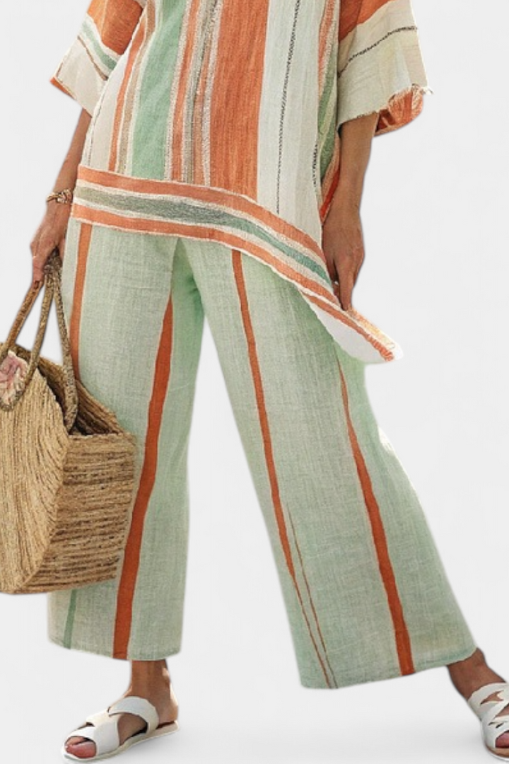 Conjunto feminino de verão em algodão com blusa assimétrica e calças largas