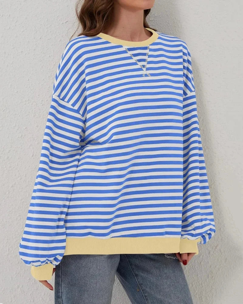 Sweter damski oversize w paski z dzianiny casualowy luźny krój na jesień