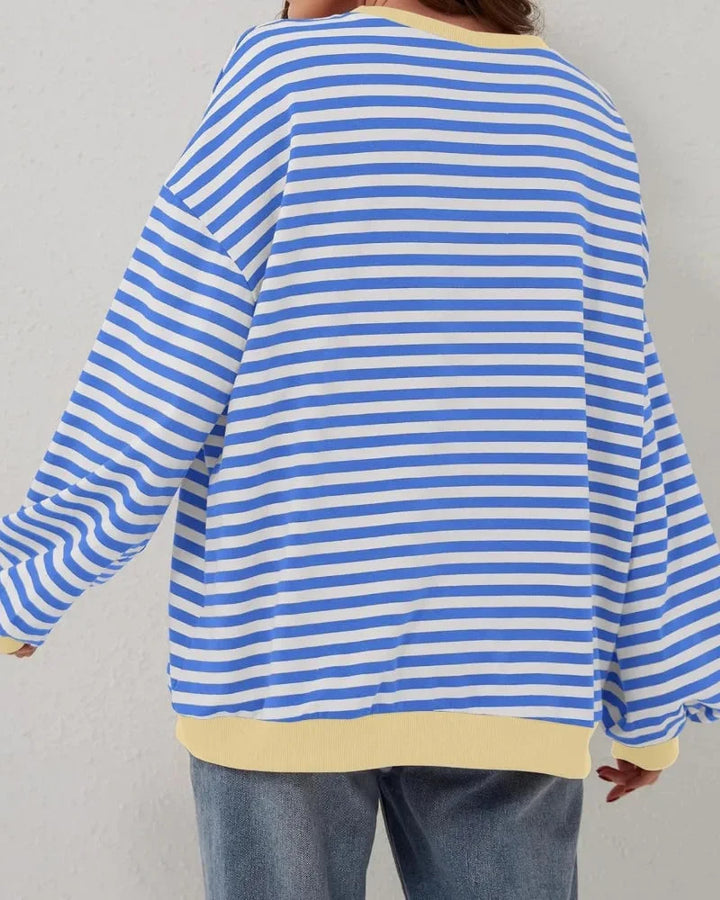 Sweter damski oversize w paski z dzianiny casualowy luźny krój na jesień